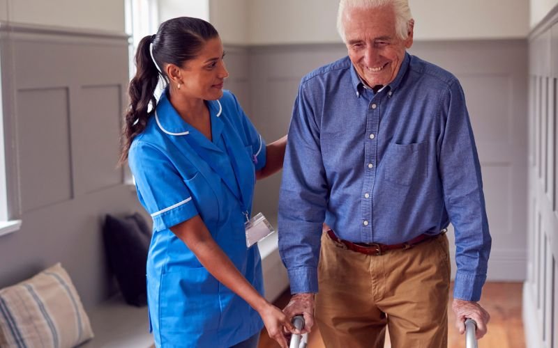 care worker and senior man