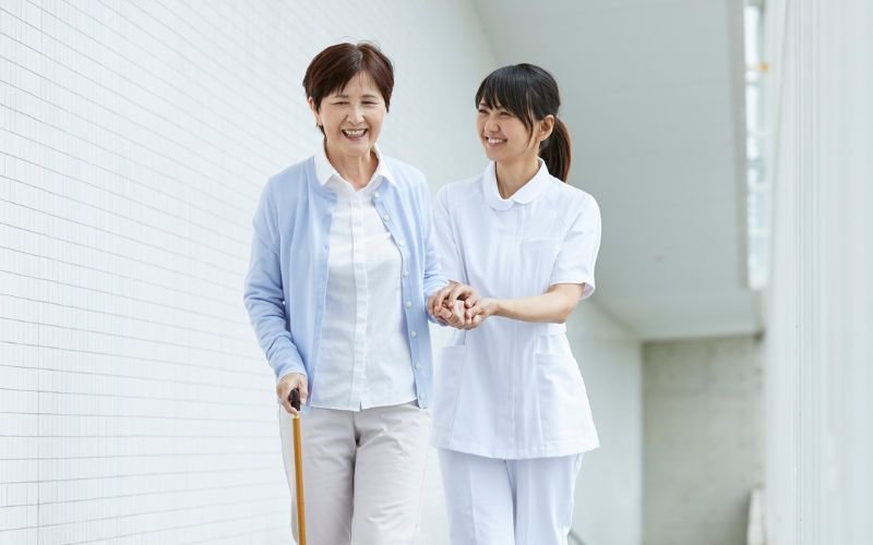 Care worker treating an older person with dignity and respect